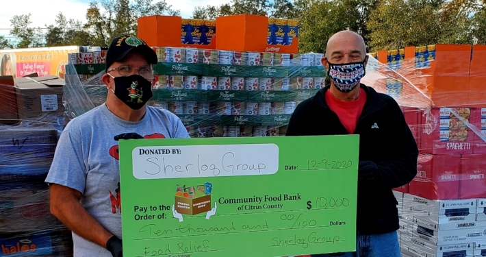 Community Food Bank is Honored to be Presented with a $10,000 Donation from SHERLOQ® Group